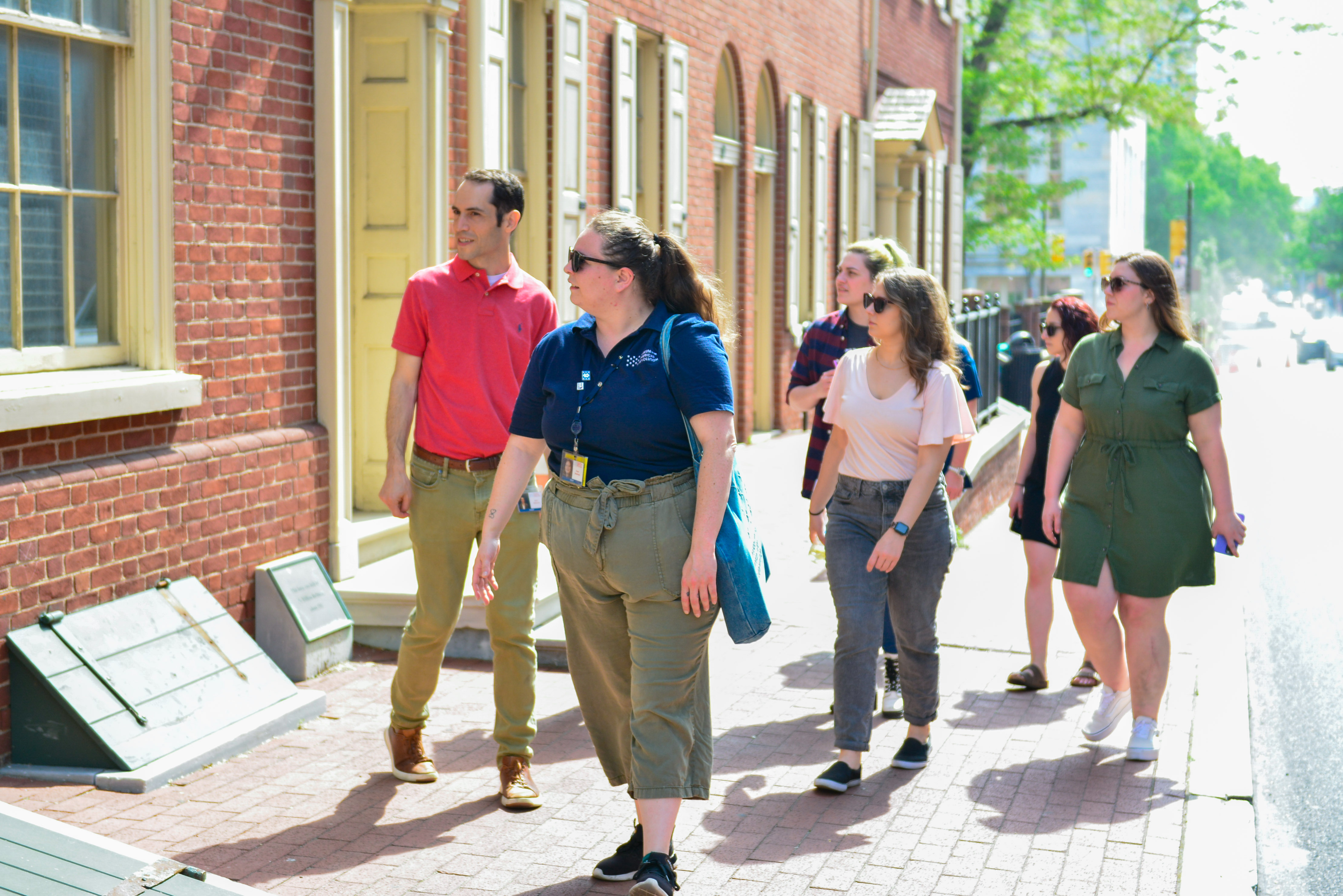 A Museum educator leads a group on a walking tour in the Museum's Old City neighborhood.