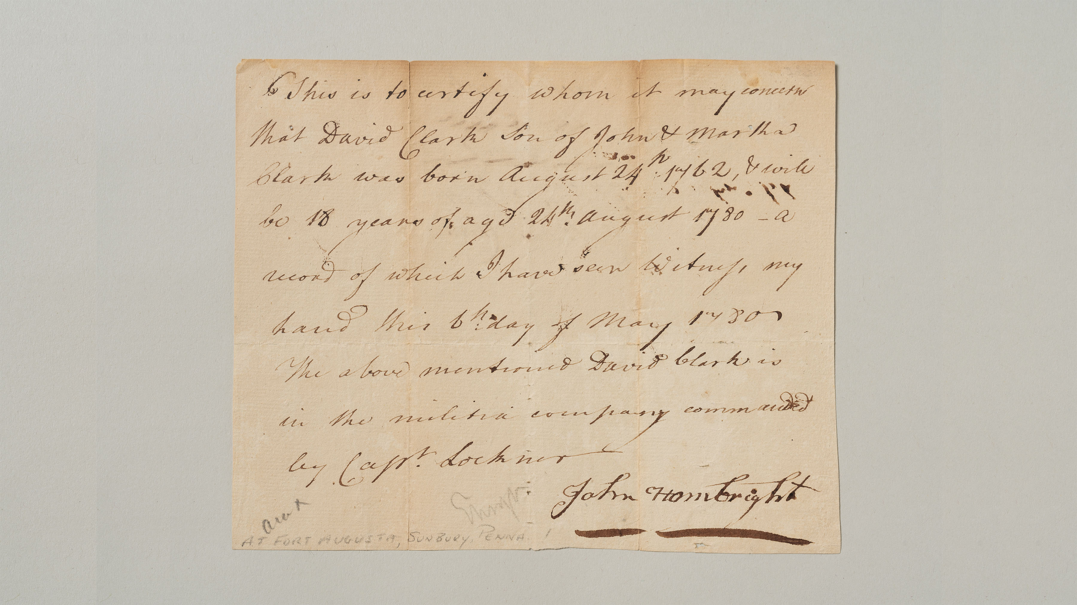 This image shows a handwritten 18th century document on aged brownish paper that certified the age of a Continental Army soldier.