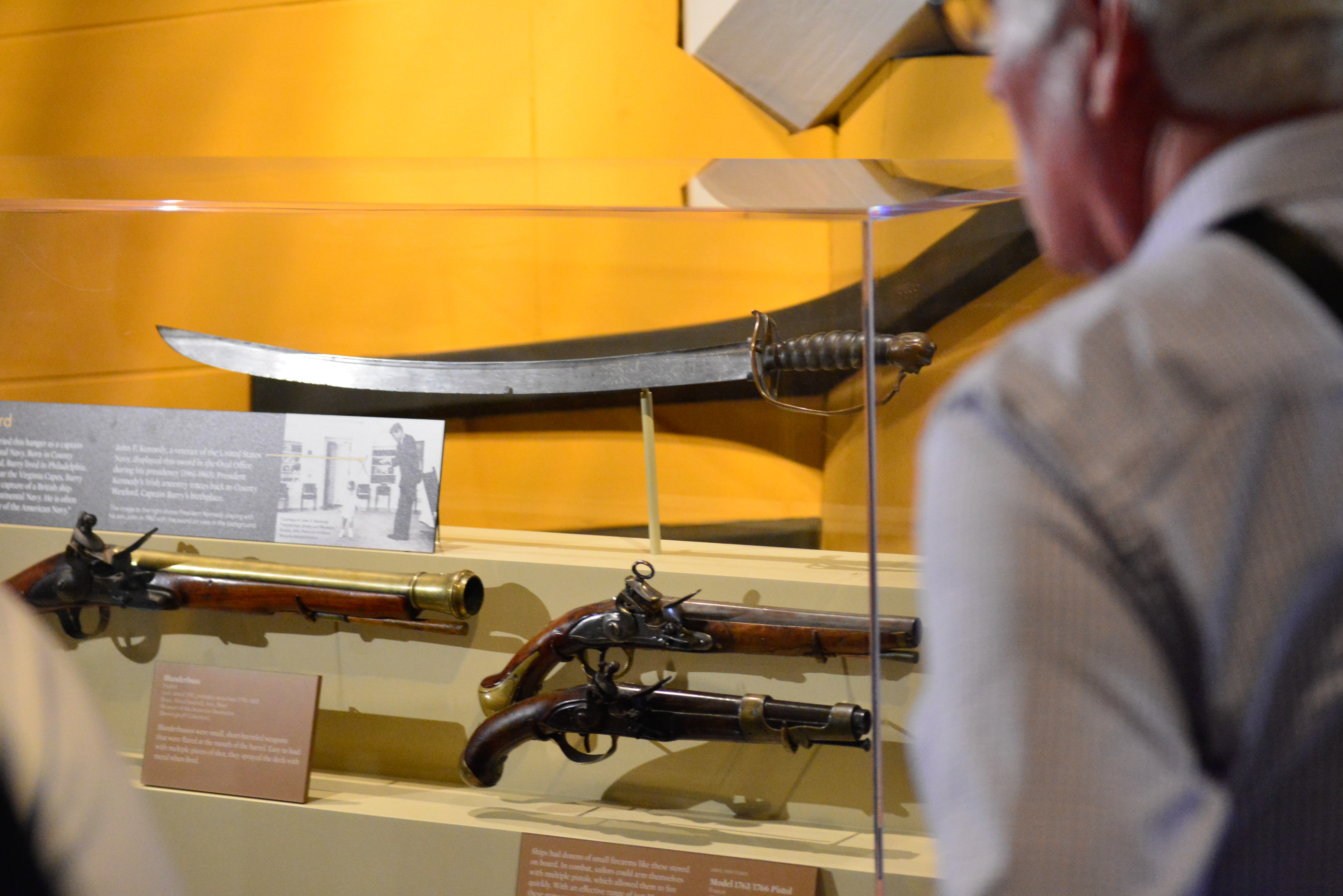 A visitor views Commodore John Barry's sword on display at the Museum.