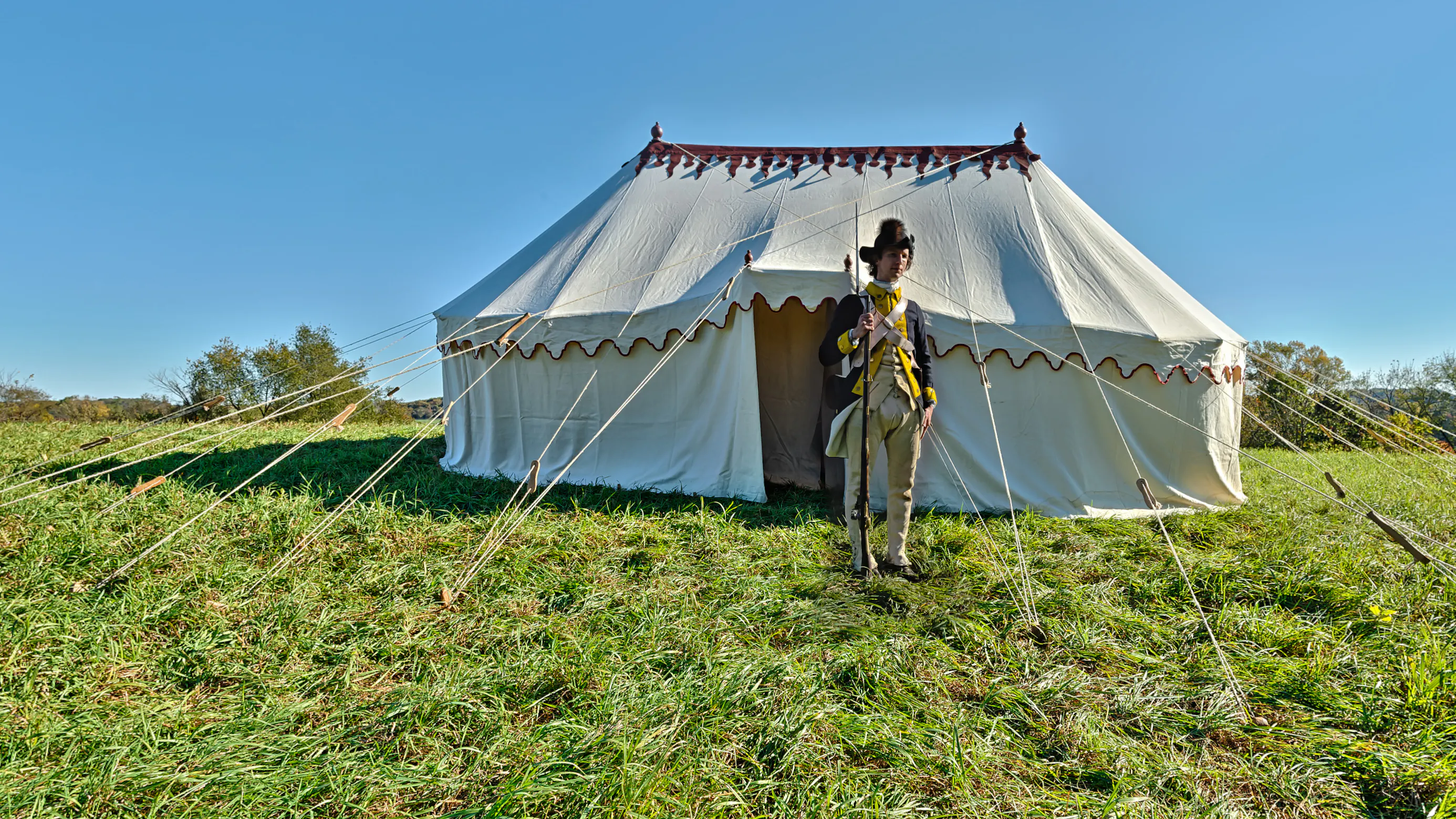 Washington's Field Headquarters featuring the Sleeping Marque tent and a soldier guarding it