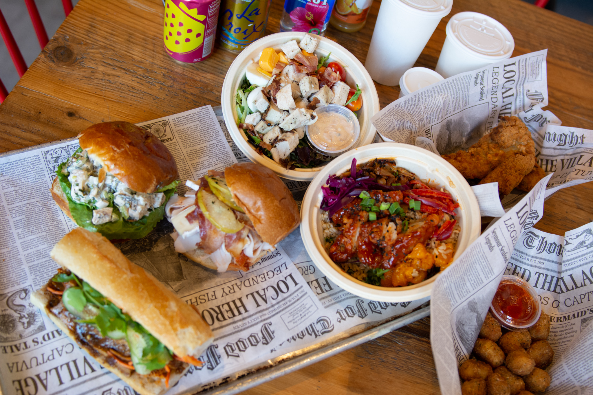 A variety of foods, including sandwiches and salads