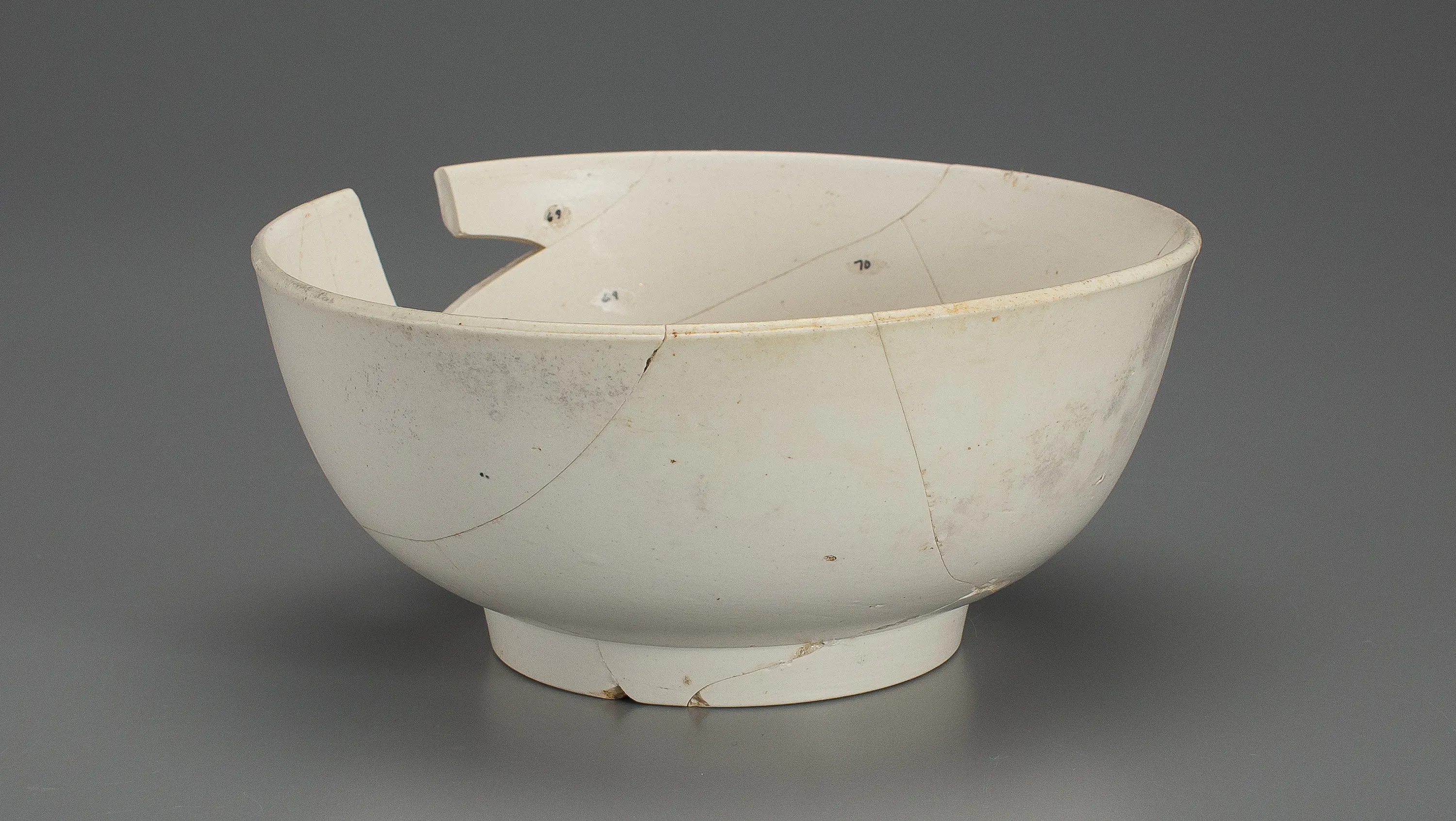 This image shows a Philadelphia Porcelain Punch Bowl. The bowl is slightly broken and was found during an archaeological excavation during the Museum’s construction.
