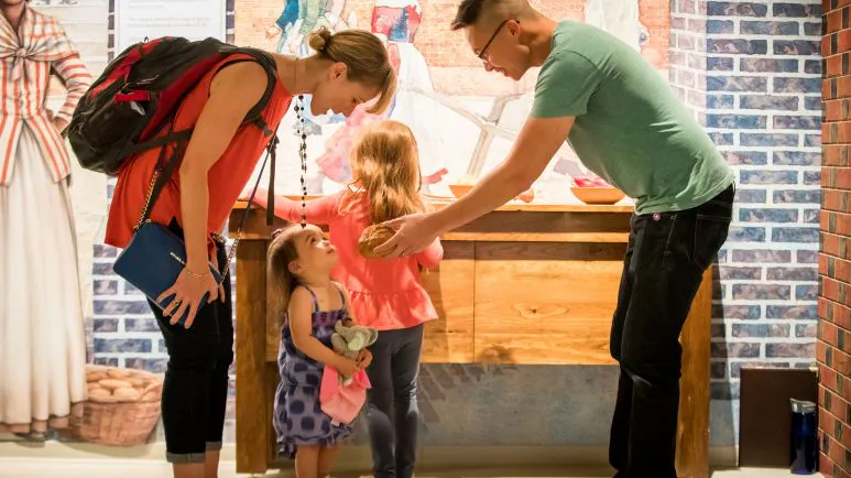 Guests at an interactive exhibit
