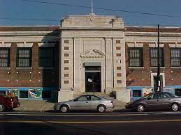 The brick and stone facade of the Wyoming branch library in Philadelphia.