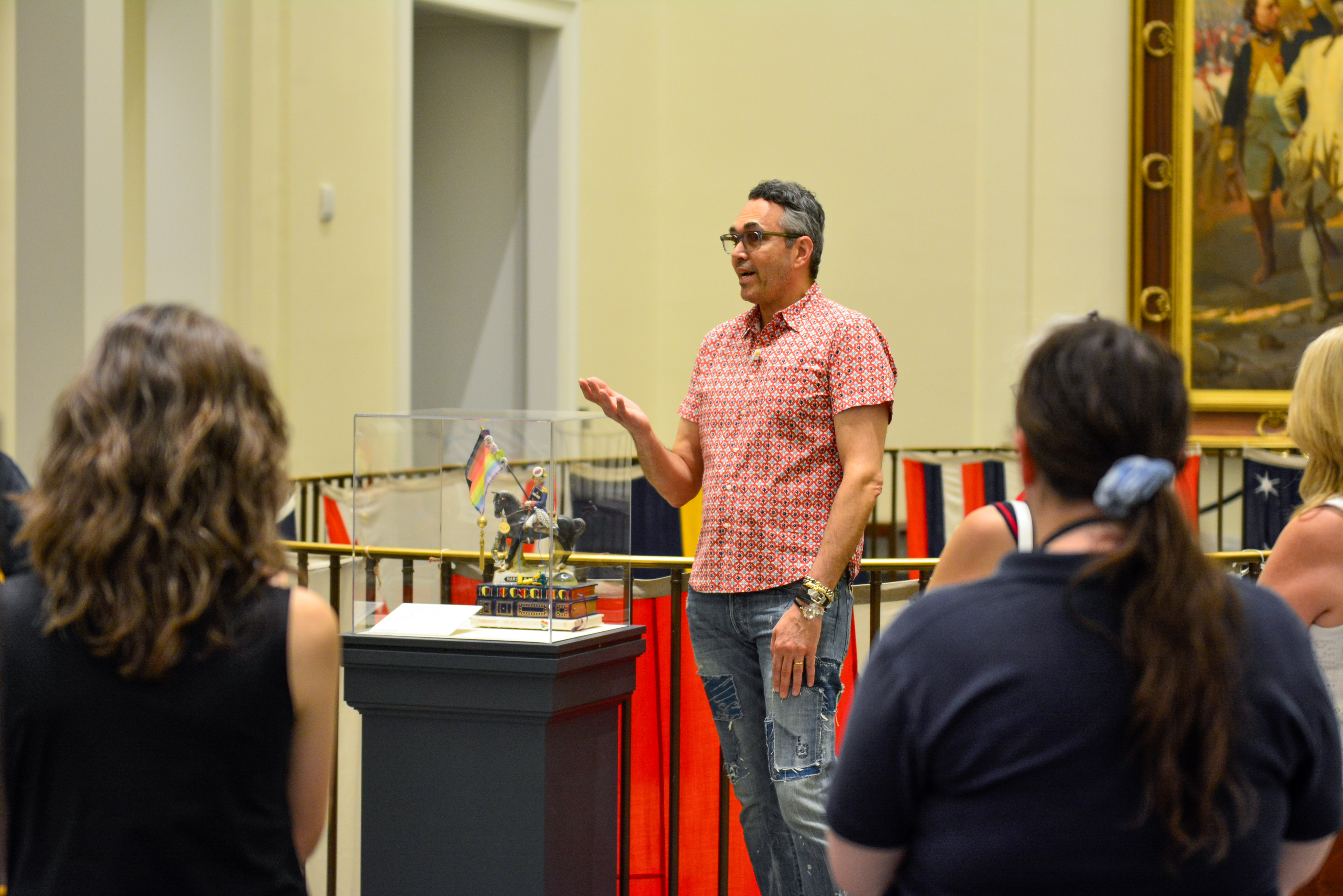 Artist John Wind leads guests on a tour of his Whiskey Rebellion sculpture installation in the Museum's second-floor atrium.