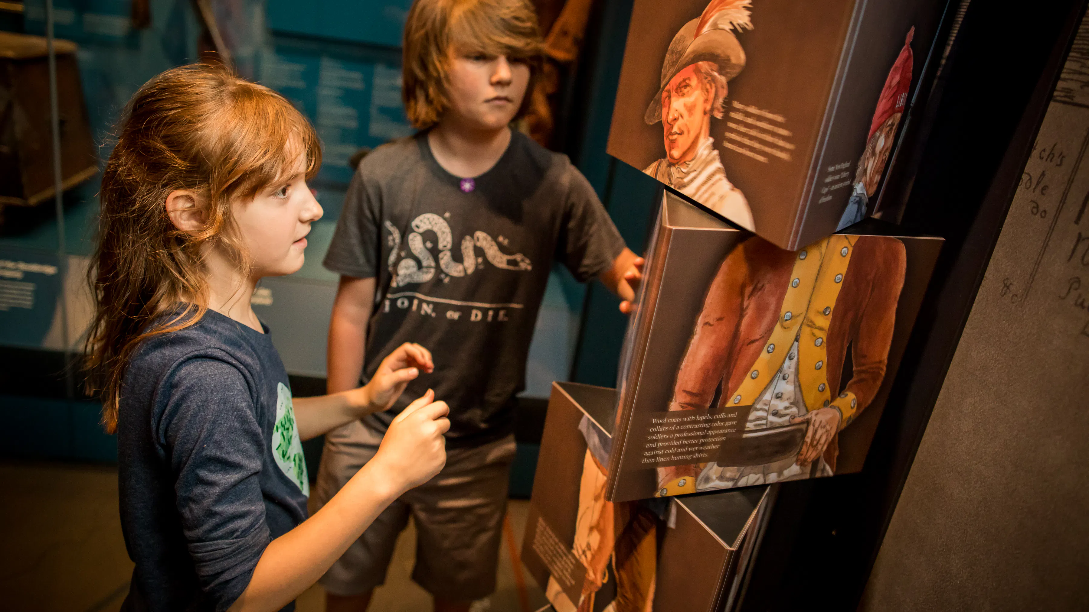 Two children in a museum gallery