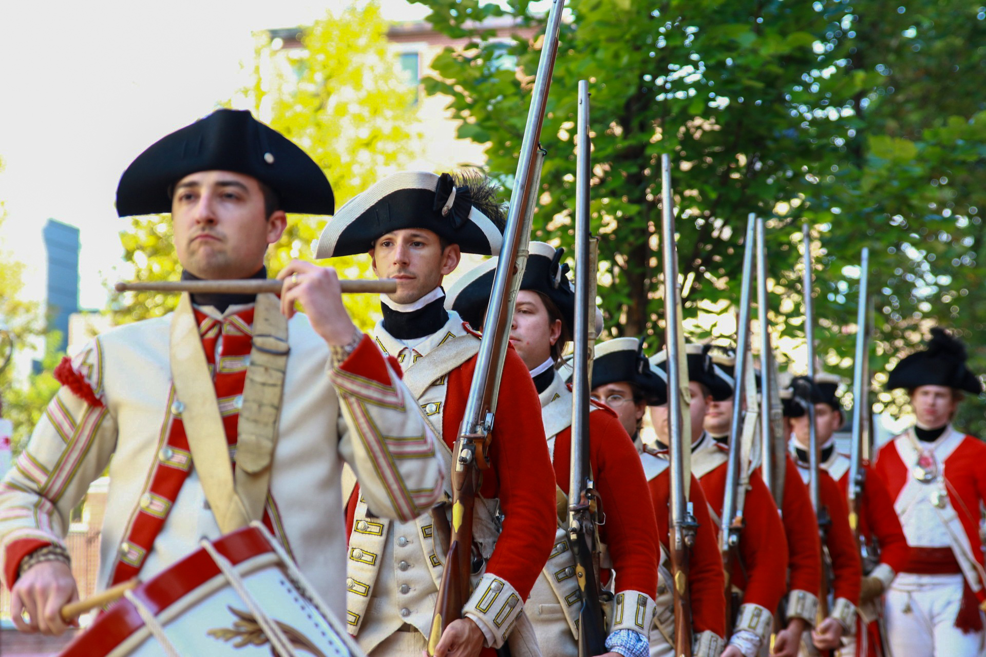 British soldiers march towards the Museum led by a drummer as part of the Museum's Occupied Philadelphia living history event in 2019.