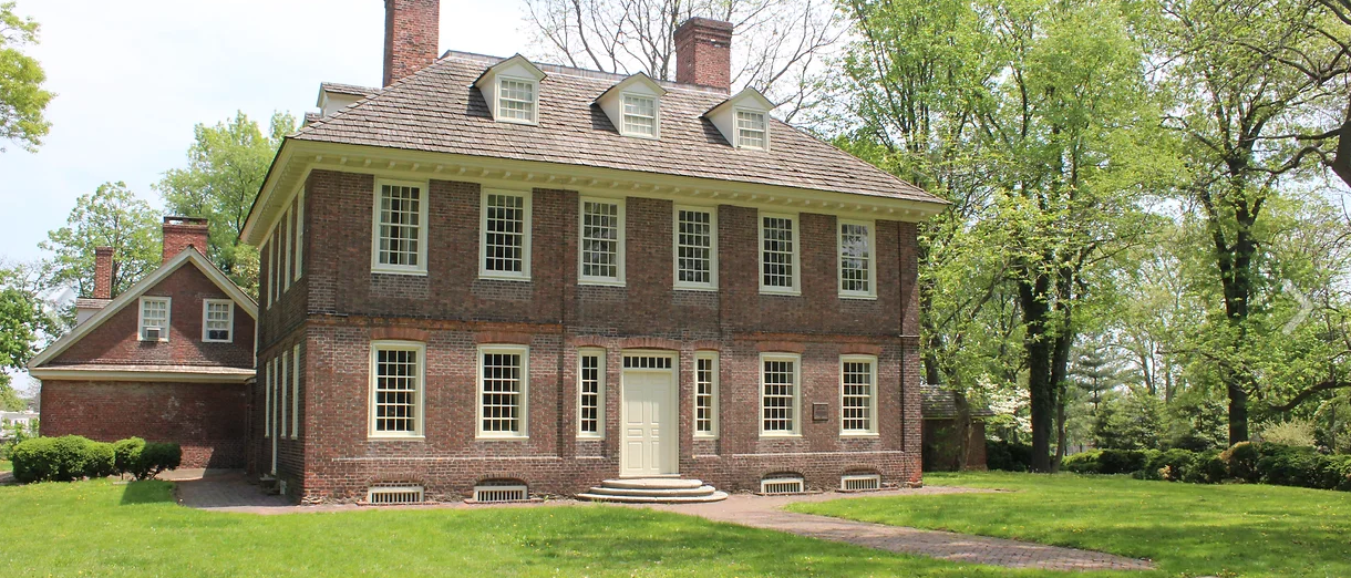 This image shows the red brick house that is Stenton in Germantown
