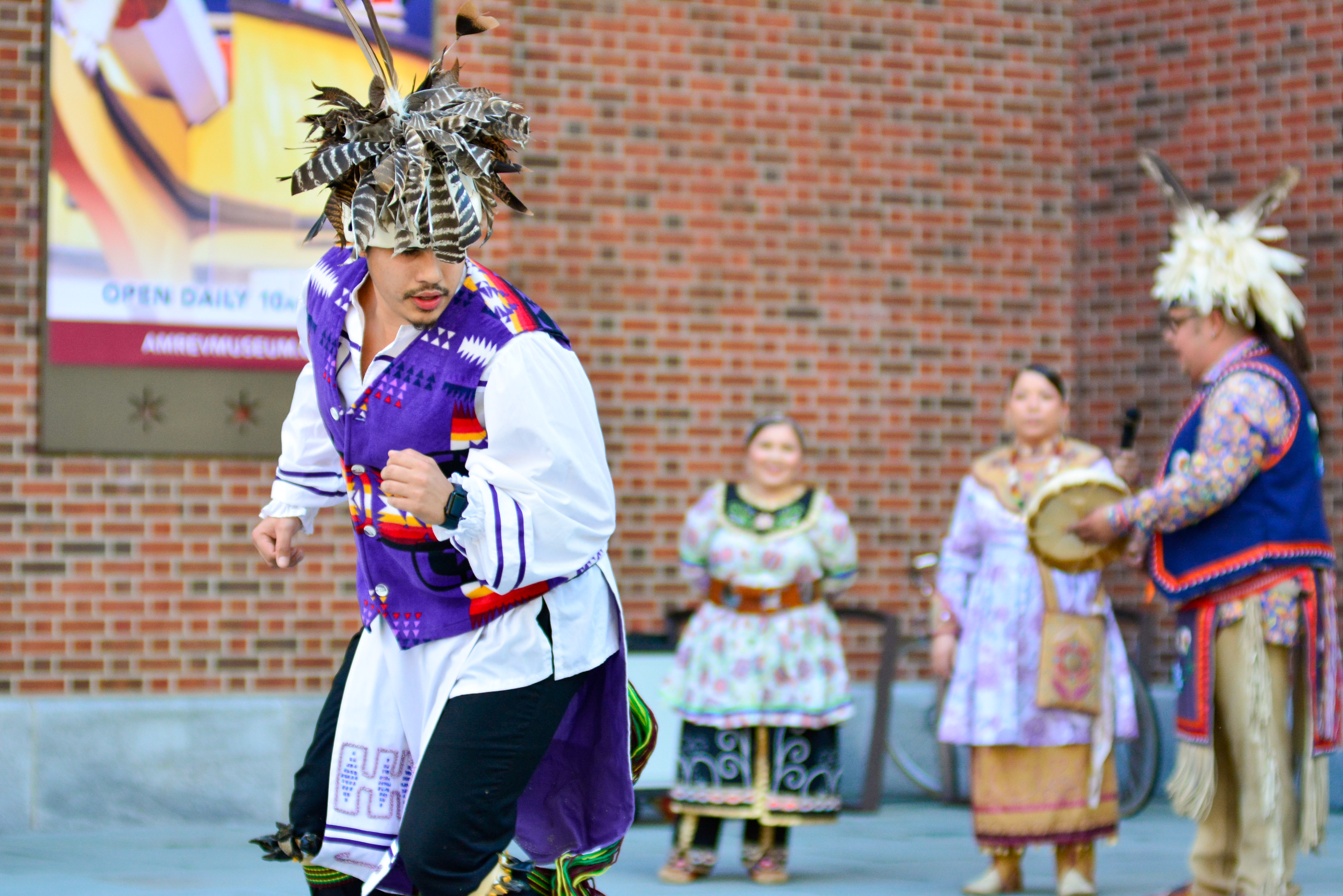A dancer performs traditional Iroquois social dances on the Museum plaza.