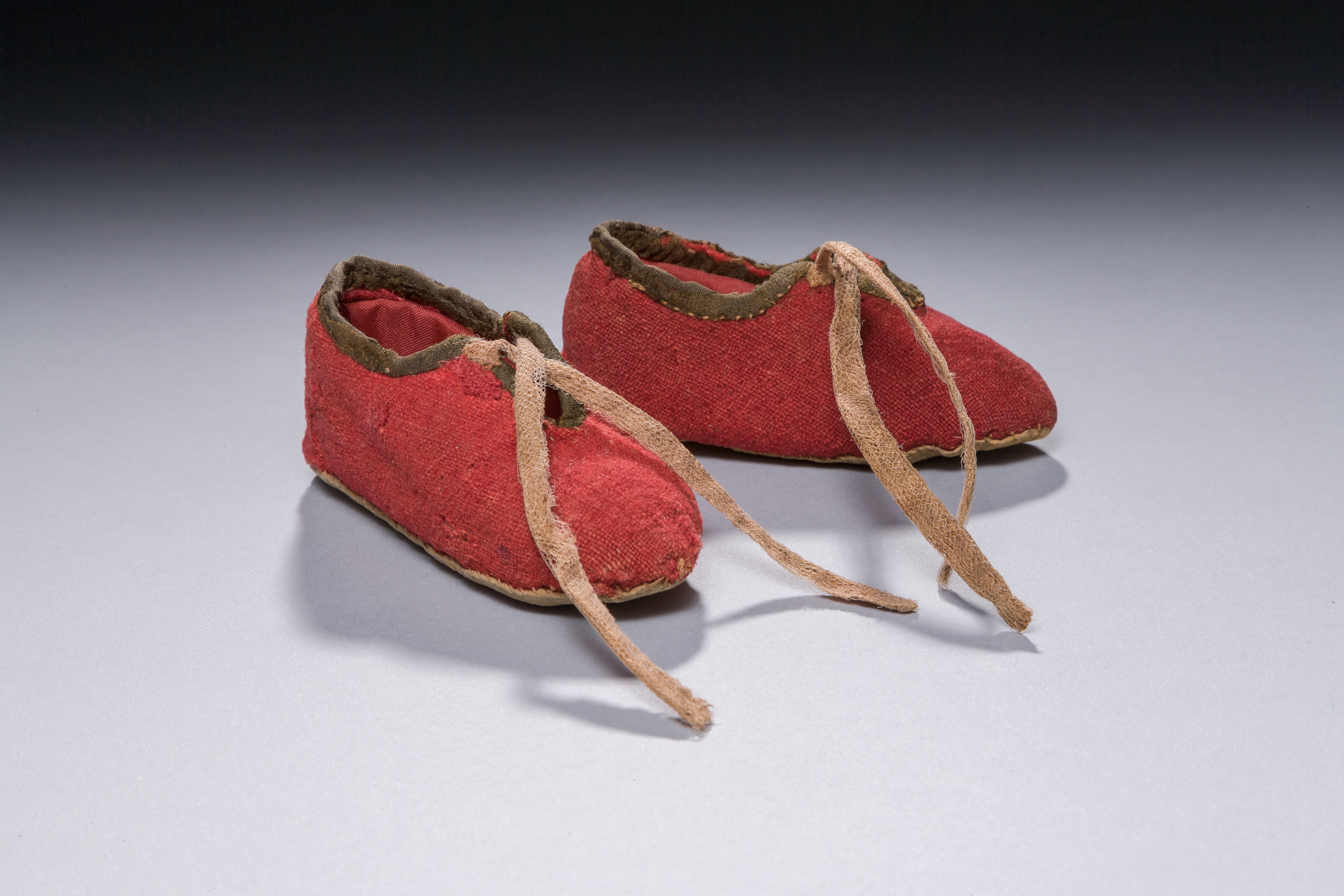 These red baby booties belonged to the family of James Davenport.