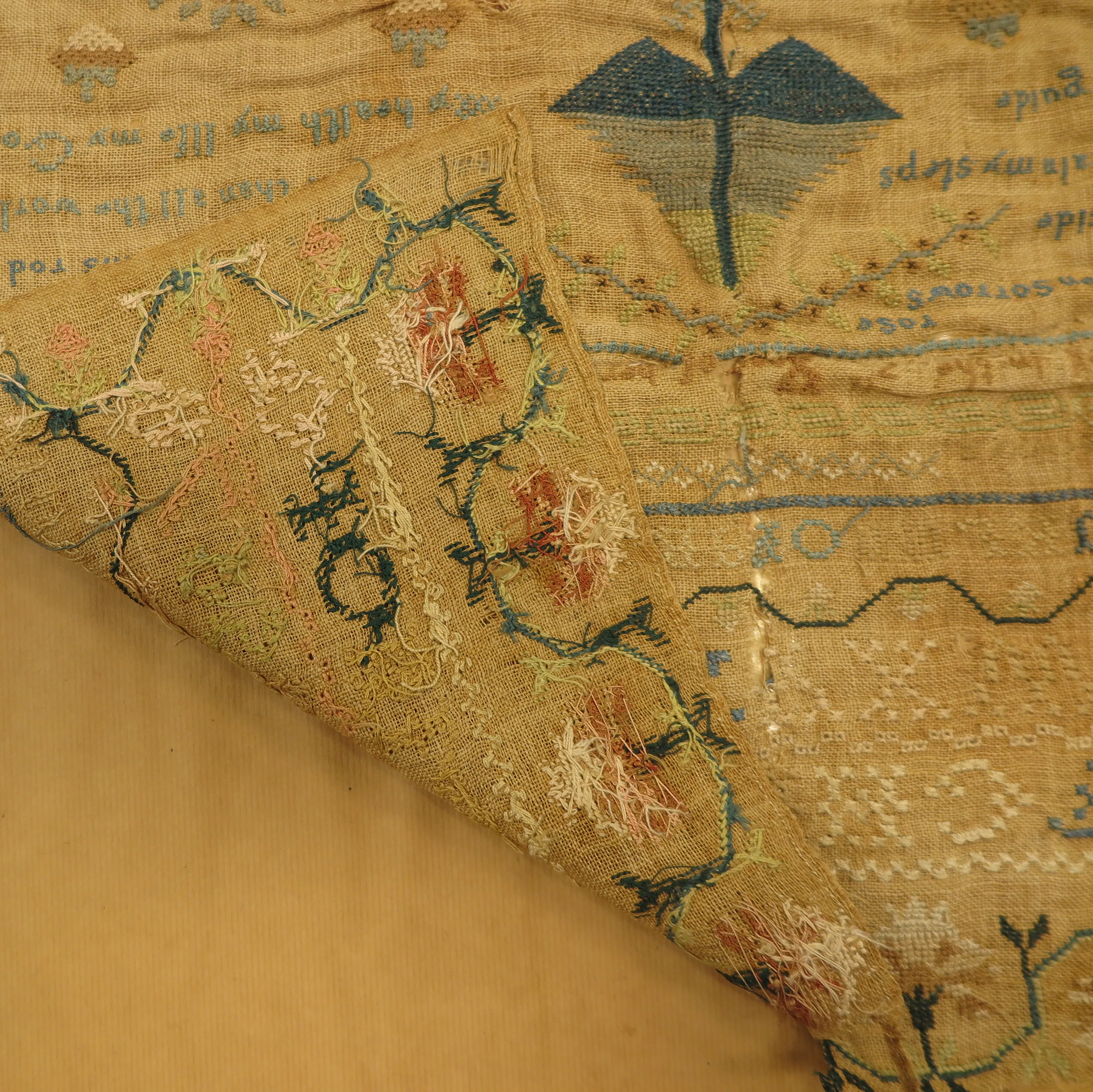 Underside of the sampler before conservation.