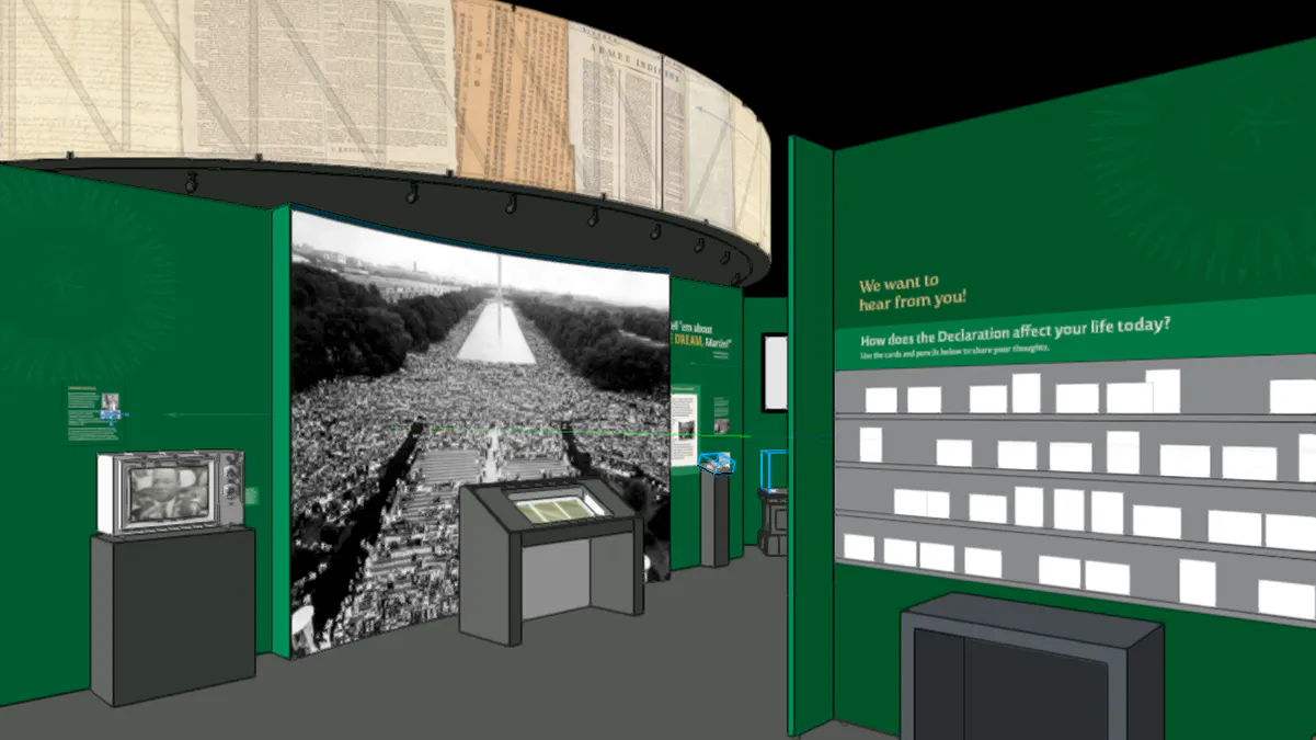 A gallery space with green walls, a view of the March on Washington on the left in the background, and a comment card wall on the right in the foreground.