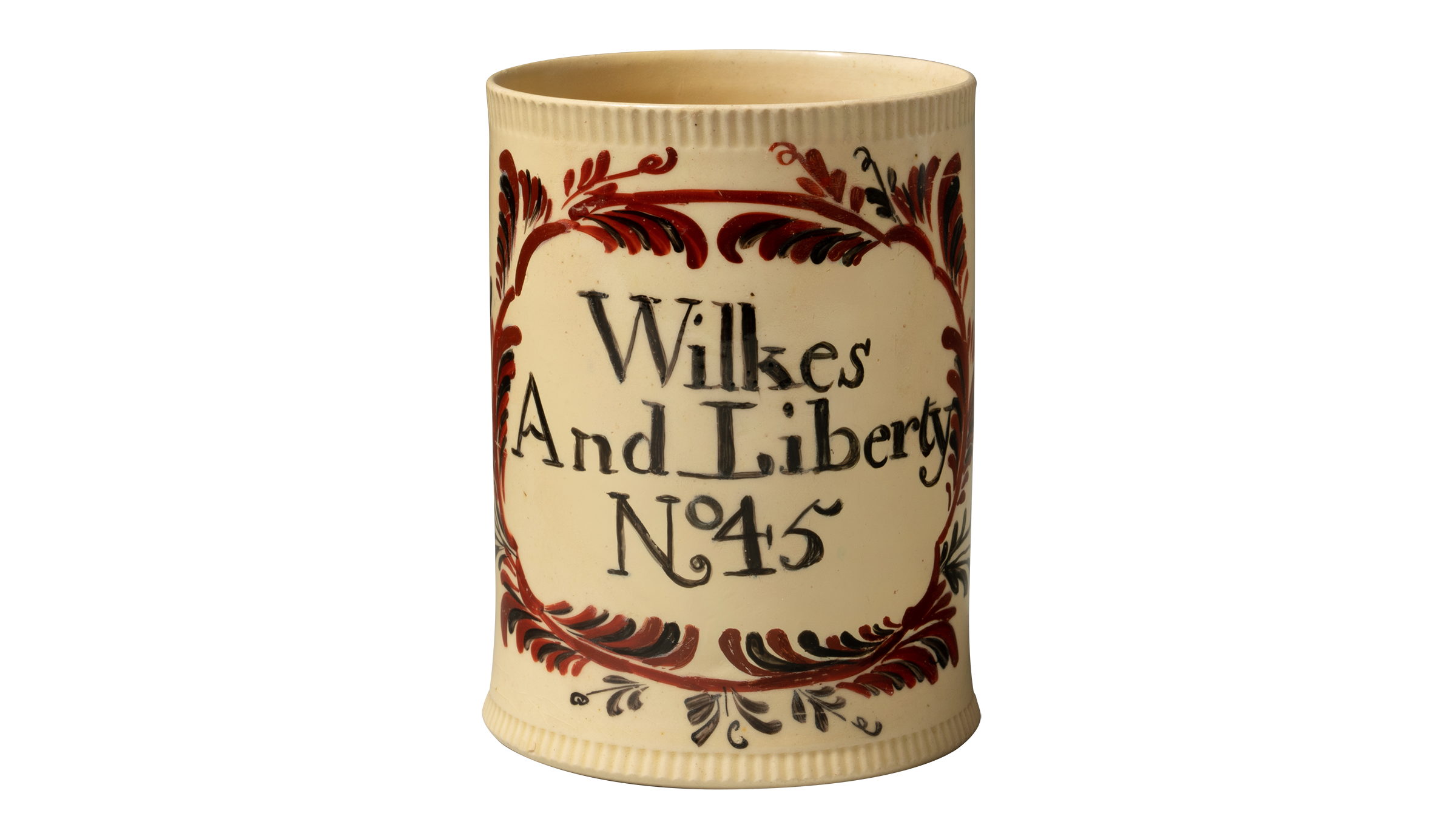 A large creamware mug featuring the words wilkes and liberty no 45.