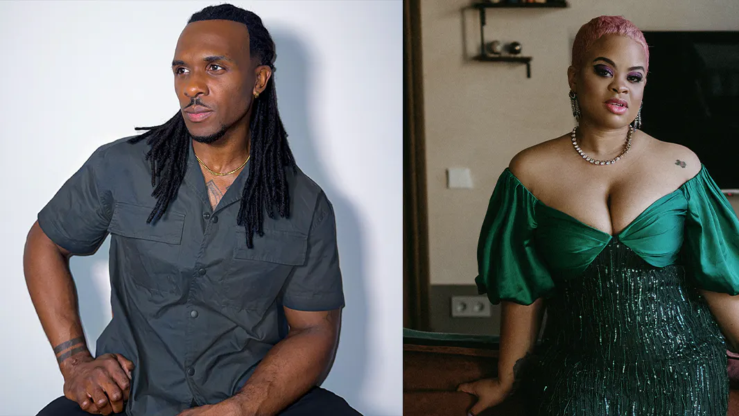A Black male with braids and a grey shirt on the left and a Black female with short pink hair and a green dress on the right, posing.