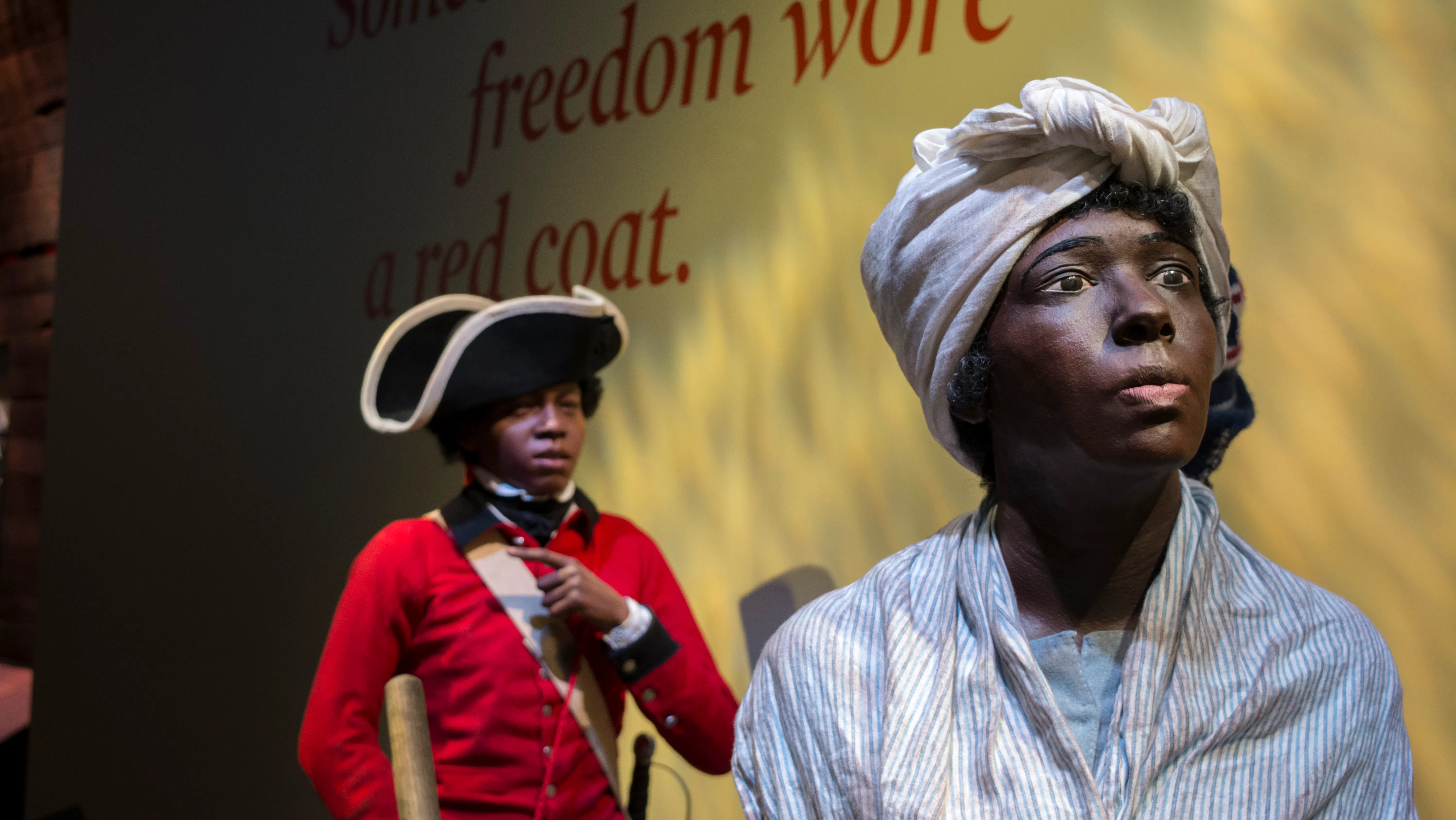 The Deborah and London Tableau figure at the Finding Freedom interactive in the galleries.